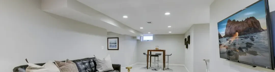 Finished basement remodel with home theater and lounge